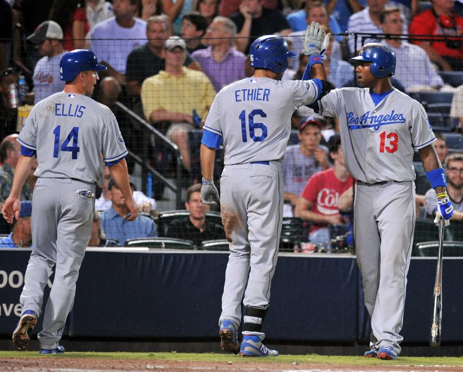 Los Angeles Dodgers Andre Ethier (16) gets a high-five from teammate Hanley Ramirez (13) after his two-run home run in the sixth inning against the Atlanta Braves at Turner Field in Atlanta, Georgia, on Friday, August 17, 2012. (Hyosub Shin/Atlanta Journal-Constitution/MCT)