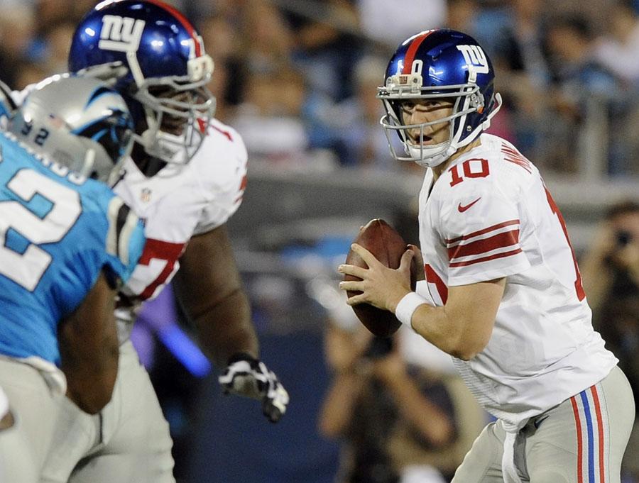 New+York+Giants+quarterback+Eli+Manning+%2810%29+watches+the+defensive+line+as+he+drops+back+to+pass+against+the+Carolina+Panthers+during+first+quarter+action+at+Bank+of+America+Stadium+in+Charlotte%2C+North+Carolina%2C+on+Thursday%2C+September+20%2C+2012.+%28Jeff+Siner%2FCharlotte+Observer%2FMCT%29