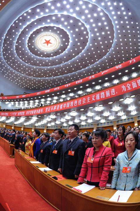 Delegates attend the closing session of the 18th National Congress of the Communist Party of China at the Great Hall of the People in Beijing, China, on Wednesday, November 14, 2012. (Rao Aimin/Xinhua/Zuma Press/MCT)