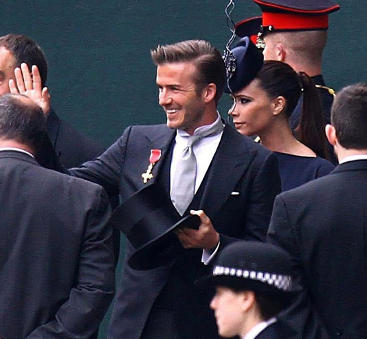 David and Victoria Beckham arrive at Westminster Abbey. David Beckham wasnt photographed wearing his top hat, but carried it like a prop. Victoria Beckhams hat was perfectly placed. (Abaca Press/MCT)