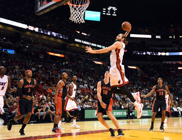 Miami Heats Josh McRoberts dunks the ball against the Toronto Raptors on Sunday, Nov. 2, 2014, at AmericanAirlines Arena in Miami. (Jim Rassol/Sun Sentinel/MCT)