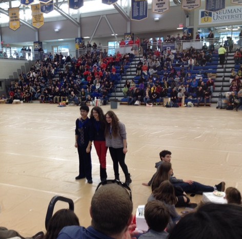 Left to right: Royce Lee, Manny Bonin, and Julia Schlaff pose at Science Olympiad regional competition.