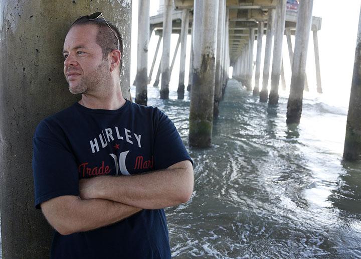 Donald Trump voter Anthony Miskulin stands underneath the Huntington Beach Pier while he explains why he voted for Donald Trump on Friday, Nov. 11, 2016. (Mark Boster/Los Angeles Times/TNS)