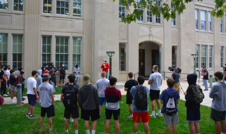 Harriton and Lower Merion football players outside of Lower Merion High School protesting the school boards decision to cancel the 2020-21 football season.